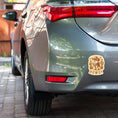 Load image into Gallery viewer, Car with a 'Howdy' sticker on the back, parked outdoors.
